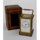 An early 20th century brass, five glass carriage timepiece with bail handle, eight day movement