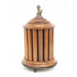 A Continental probably Dutch vari wood revolving cigar holder with central tobacco section,