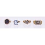 Three 9ct gold  stone set dress rings including a blue topaz claw set single stone ring, size L, a