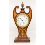 An Edwardian style inlaid mahogany mantle clock, white dial with arabic numerals, the case with swan