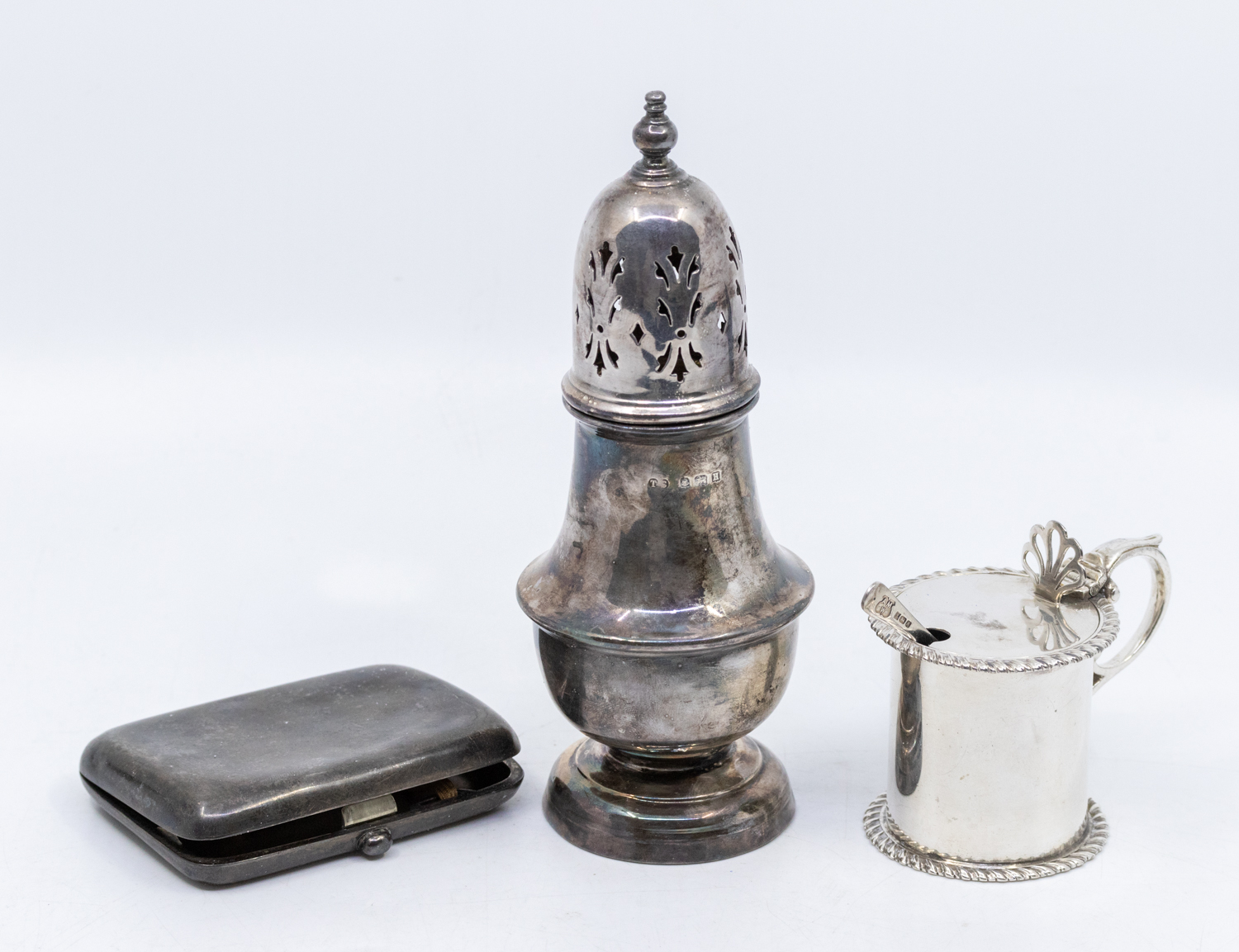 A collection of silver to include: 1. A Georgian style caster, pierced cover with urn shaped finial, - Image 2 of 3