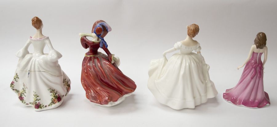 Four Royal Doulton lady figures including Nancy, Autumn Breezes, Ruby and Country Rose (damaged)