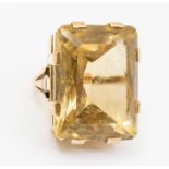 A large 9ct gold and quartz dress ring, rectangular faceted stone approx 25 x 20mm, eight claw