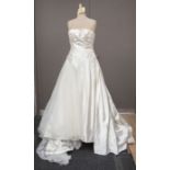A strapless wedding dress with tulle veil, 2011 by pronovias, satin and tulle gown, has a horizontal