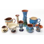 Collection of blue Torquay wares and other Torquay wares, including vases, jugs, candle holders,