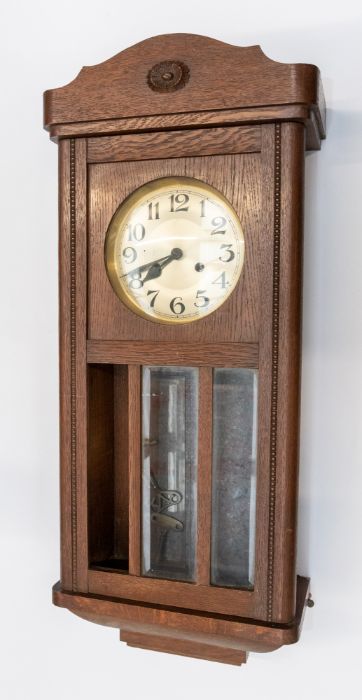 Two 1930's oak cased wall clocks