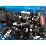 Large collection of 20th century Yashica Mamiya and Ricoh Automatic cameras including lenses
