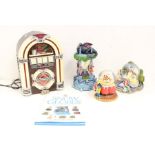 Snowglobes: A collection of three assorted Disney Snowglobes including: The Muppets and Disney
