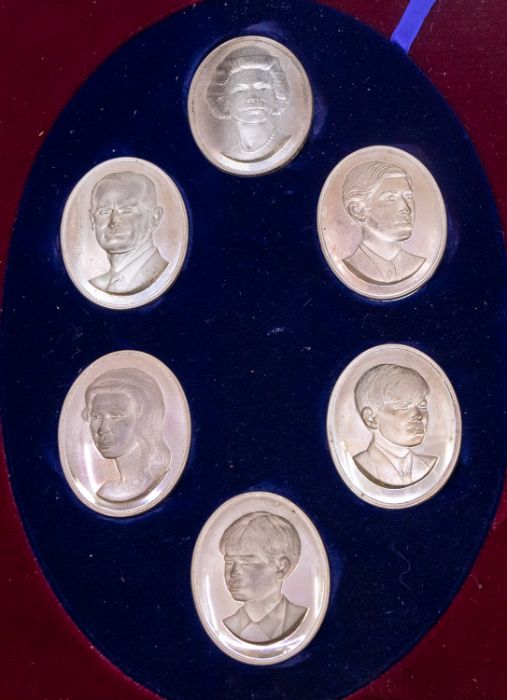 A Modern limited edition Royal Family silver portrait medallion boxed set to include: HM The