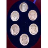 A Modern limited edition Royal Family silver portrait medallion boxed set to include: HM The