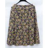 An Autumn shades brushed cotton skirt size 10 by Young Jeager. Button front with a large frill