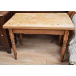 An antique pine small dining table with a pipe spindle back pine chair