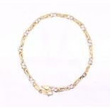 An 18ct two tone bracelet, width approx 3mm, length approx 20cm, weight approx 8gms Further details: