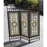 An Arts & Crafts three fold large fire screen with simulated bamboo frame, the centre screens each