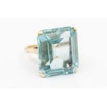 A retro style synthetic spinel and 9ct gold dress ring, comprising an emerald cut synthetic