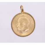 A George V sovereign dated 1913, within a 9ct gold mount, total gross weight approx 9.3gms