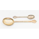 An Arts & Crafts large silver spoon with shaped terminal, hallmarked by Jackson & Fullerton,