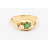 An Victorian style emerald and diamond three stone 9ct gold ring, comprising a star set round cut