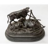 A bronzed early 20th Century figure of cattle on heavy marble stand, by J Moigniez