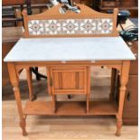 A pine marble-topped washstand along with a Victorian mahogany side cabinet