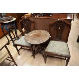 An 18th Century oak tripod table with bird cage mechanism, along with two George III mahogany dining