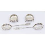 A Edward VII pair of silver serving spoons with pierced foliate and scroll decoration, with shaped