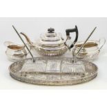 A Viner's of Sheffield EPNS three piece Georgian style tea service together with a plated & glass