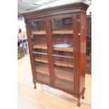 Tall floor-standing Victorian mahogany glazed Bookcase on ball-and-claw feet with two front-glazed