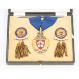 A Walker & Hall Lord Mayor 9ct gold shield medallion with Leicester town crest with red and white
