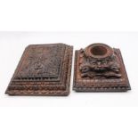 A late 19th Century Black Forest carved wooden desk inkwell, along with matching note paper box with