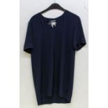 A Jean Muir tunic top in navy. Size 8. Short sleeves and a T neckline fastened with a button. A long