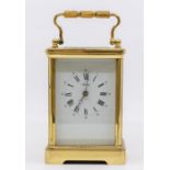 An Asprey large striking carriage clock with key