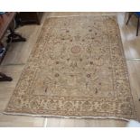 Large Eastern rug beige ground eastern turkish 273cm x 185cm
