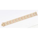 A tri colour 9ct gold link bracelet, comprising brick like linke of alternate yellow, white and