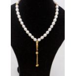 A cultured pearl and 18ct gold necklace, comprising ovoid pearls approx 10 8mm, length approx