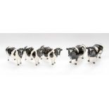 A collection of five black and white cattle, including Champion examples (5)