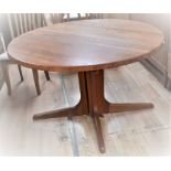 Late 1960s / early 1970s Danish circular extendable teak dining table on pedestal base by C J