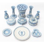 Collection of Wedgwood jasper wares, mostly pale blue, including pots, candlesticks, jugs, dishes