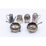 A group of silver condiments to include: a pair of Scottish salts, hallmarked by Thomas Smith &
