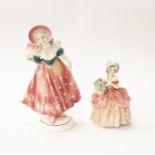 A mid 20th Century Royal Doulton lady figure along with another unnamed lady figure