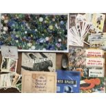 Collection of marbles and Tea/cigarette cards.