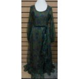 A 1970’s Abigail’s party long chiffon dress in turquoises, high waisted full skirt, size 12 to 14. A