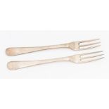 A pair of George III Irish silver Hanoverian dessert forks, each reverse handle engraved with a