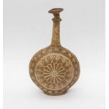 A North African early 20th Century water vessel, made from the stomach lining of an animal, with