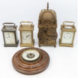 Three brass mantle clocks, reproduction brass lantern clock, round wall barometer