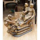A large Polychrome sleigh/Chariot with cherub and ladies riding to rear.