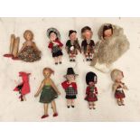 A collection of 1950's dolls, including wooden and plastic, Continental and tourist examples