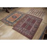 Two hand knotted Turkish rugs 162cm x 126cm & 173cm x 120cm along with a thrown same region