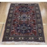 Kazak 20th century rug blue ground 190cm x 138cm along with an Avshar Bozar rug red and blue