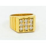 A gents diamond set 18ct gold signet ring, comprising three rows of round brilliant cut diamonds,